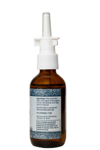 Zijkant van het flesje Wild Mamas Wild Relief met productinformatie
